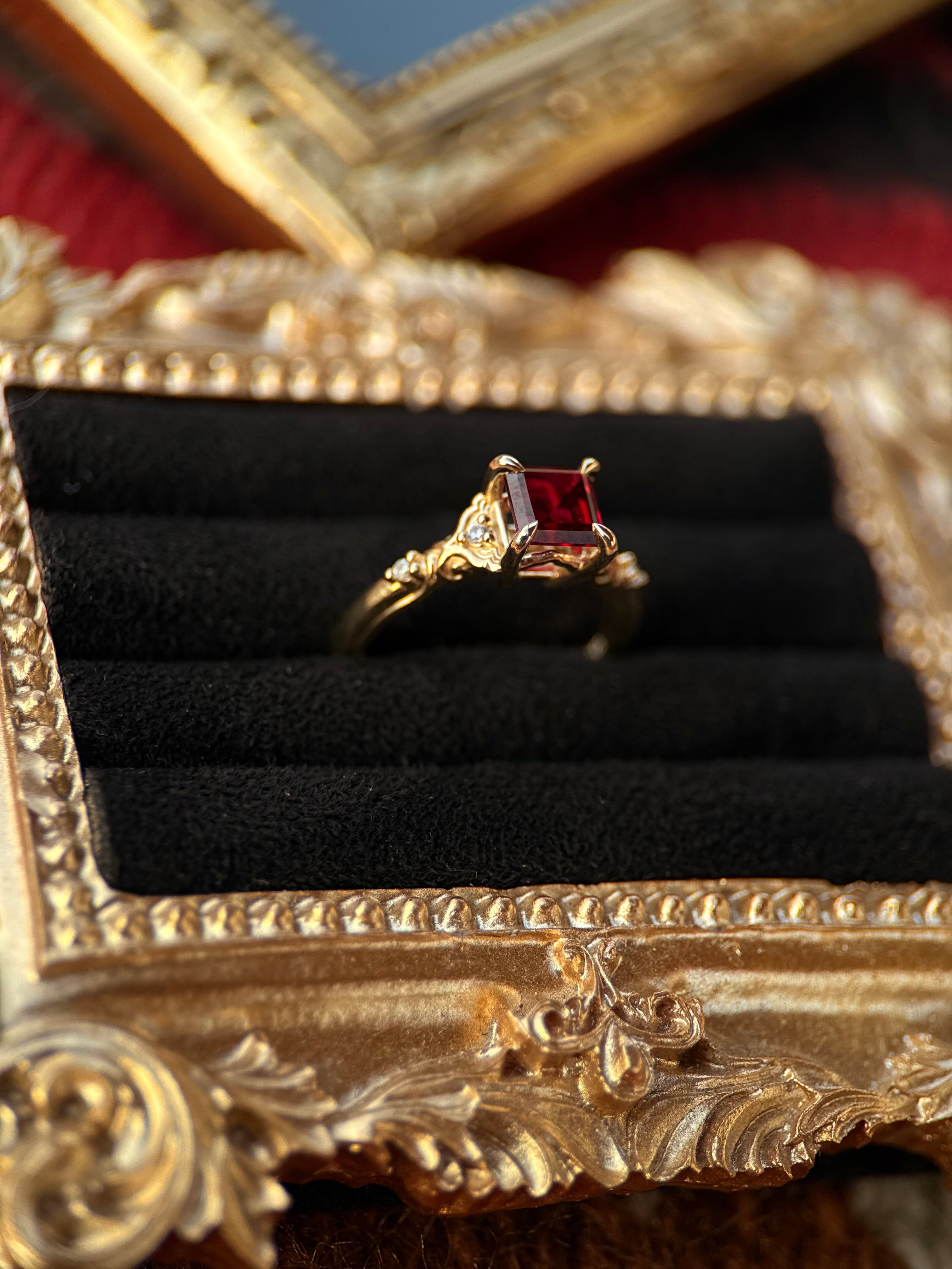 10K YELLOW GOLD PRINCESS GARNET.