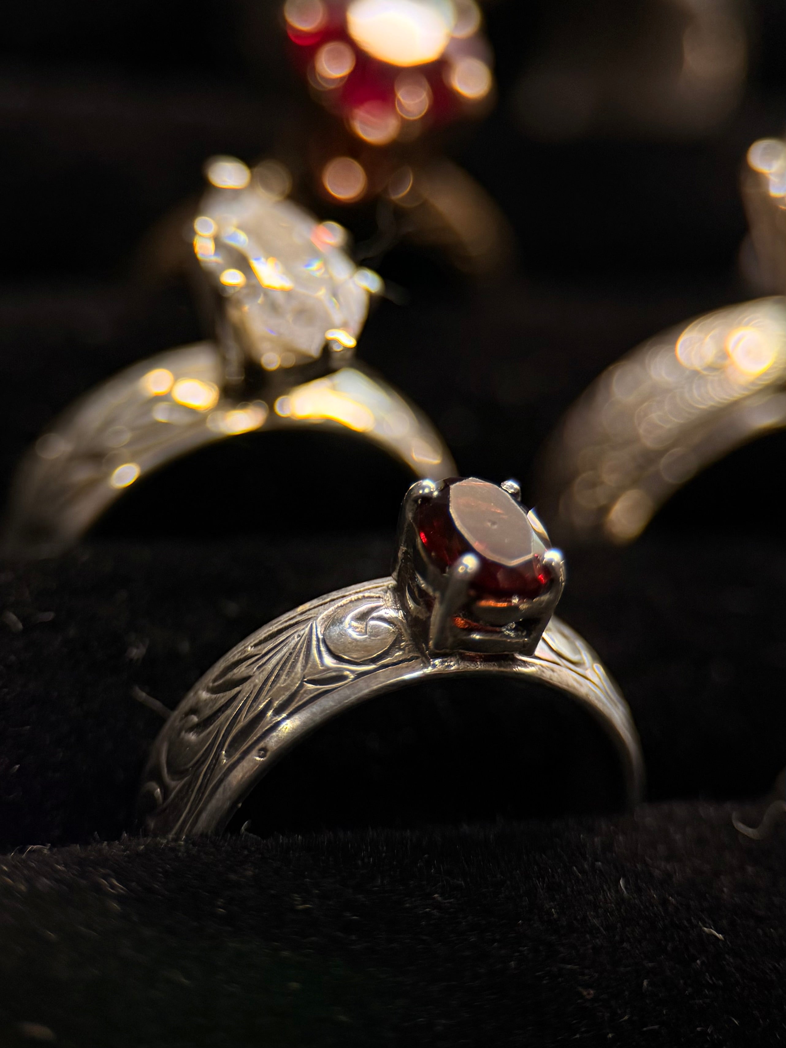 STERLING HAND ENGRAVED SOLITAIRE OVAL GARNET.