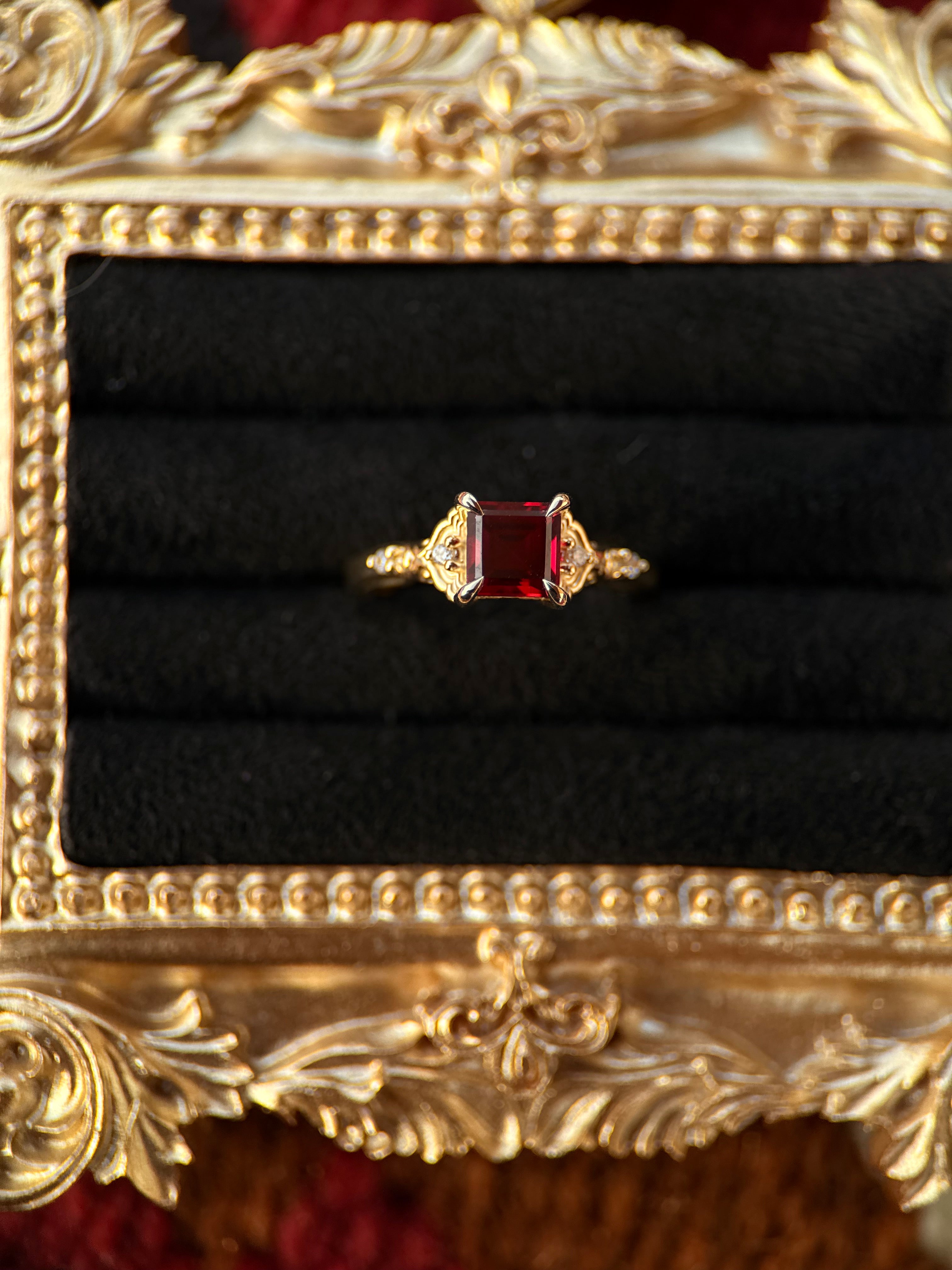 10K YELLOW GOLD PRINCESS GARNET.