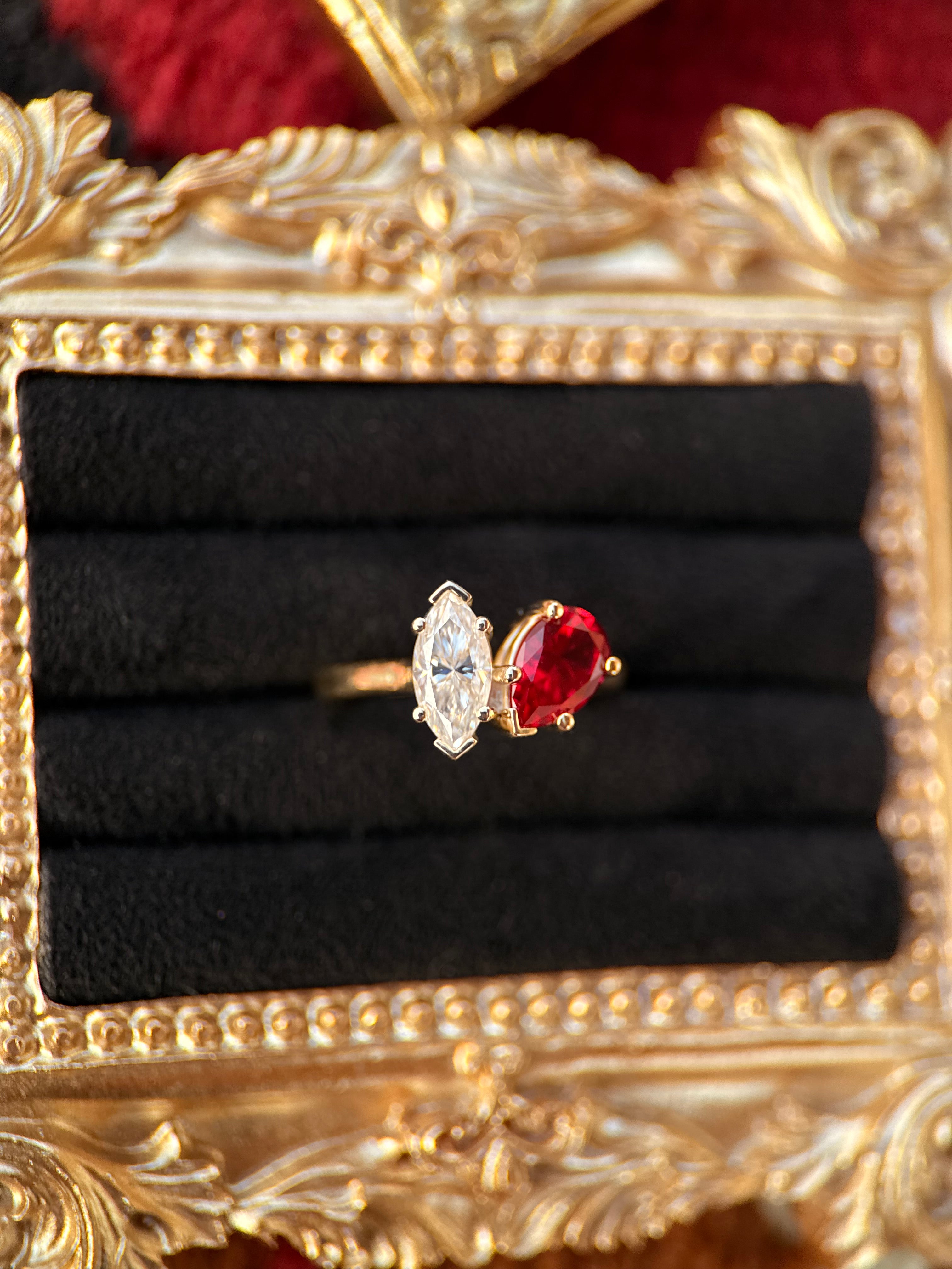 10X5 LAB MOISSANITE AND 9X6 GARNET 10K GOLD.