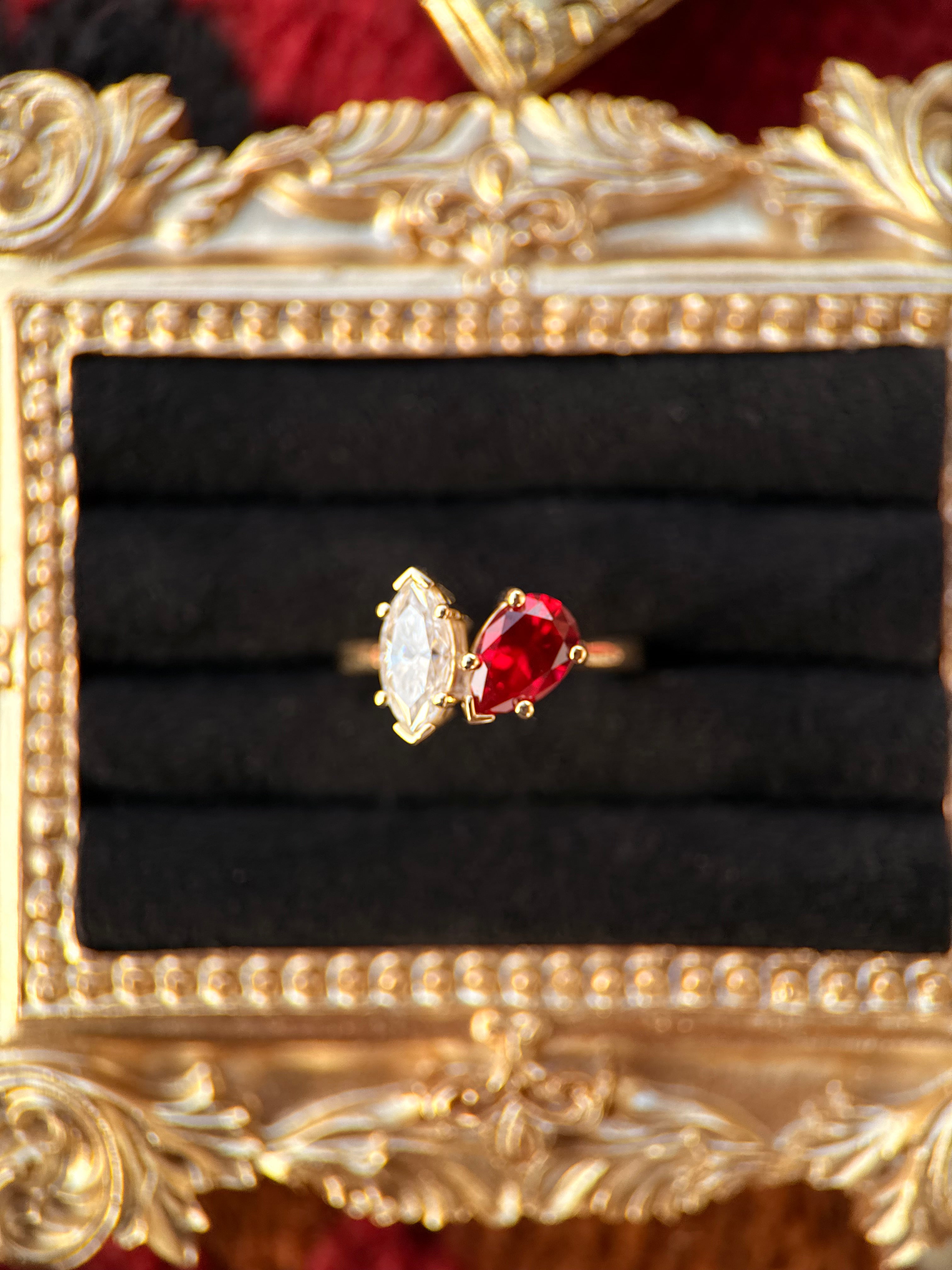 10X5 LAB MOISSANITE AND 9X6 GARNET 10K GOLD.