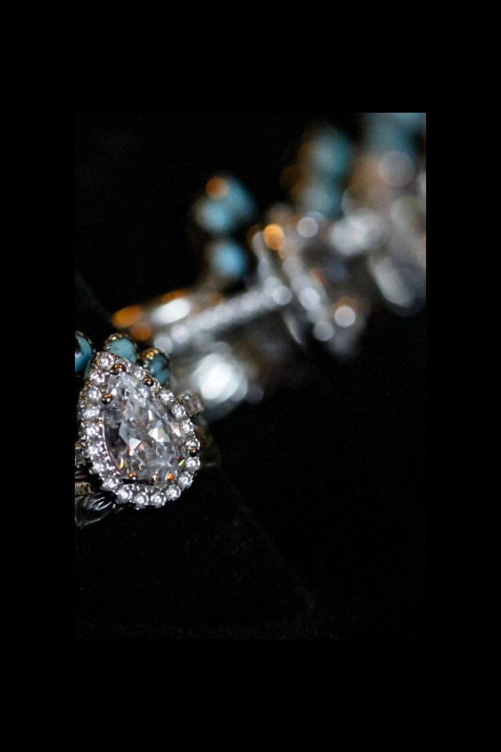 MOISSANITE PEAR HALO 14k WHITE GOLD SET.